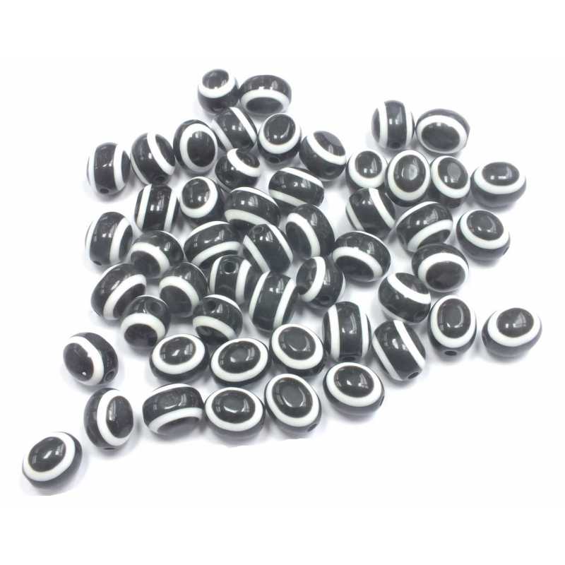 PERLES ACRYLIQUES : 25 ovales noires/blanches 10*8mm  